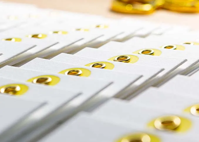 Letterpress hang tags with metal eyelets