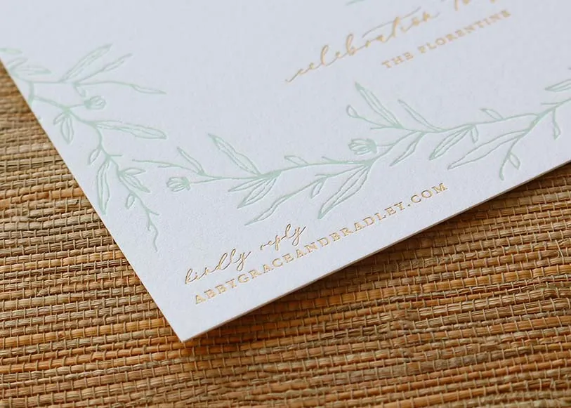 Gold foil detail on wedding invitation