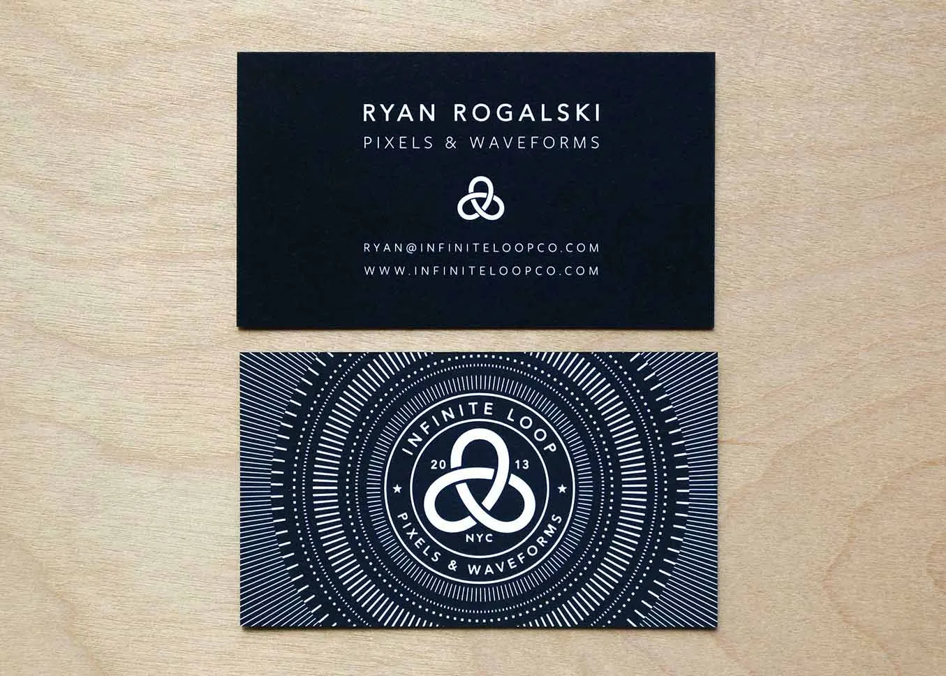 White foil business card — back side