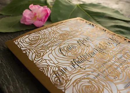 Letterpress wedding invitation with laser cut sleeve