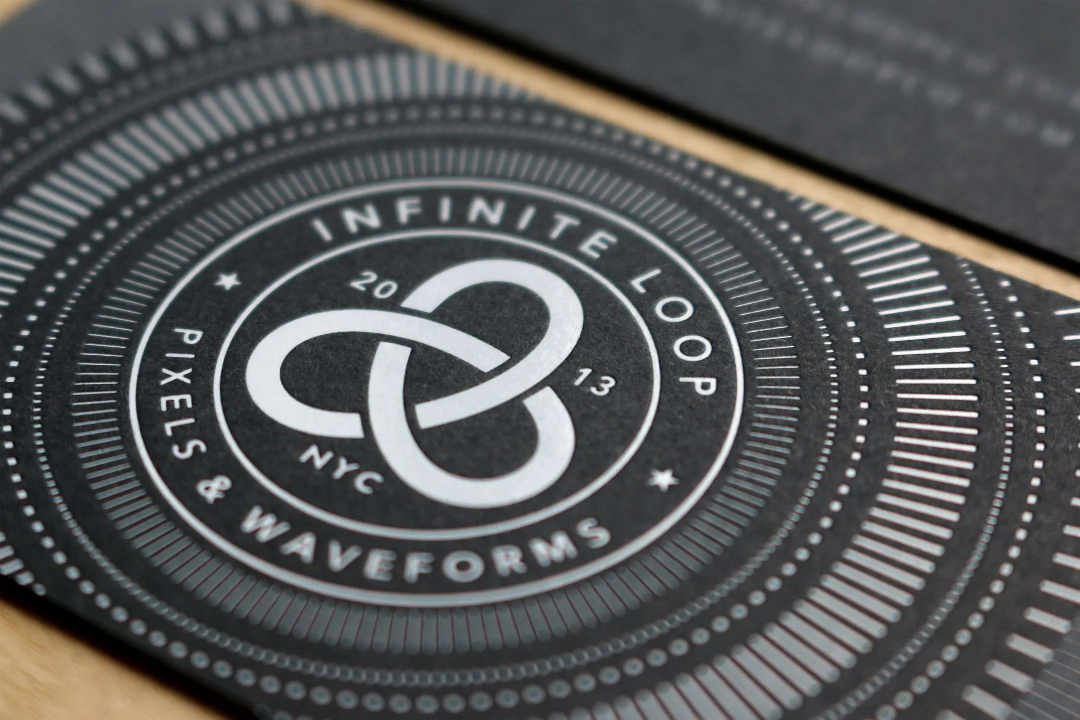 White foil stamped black business cards