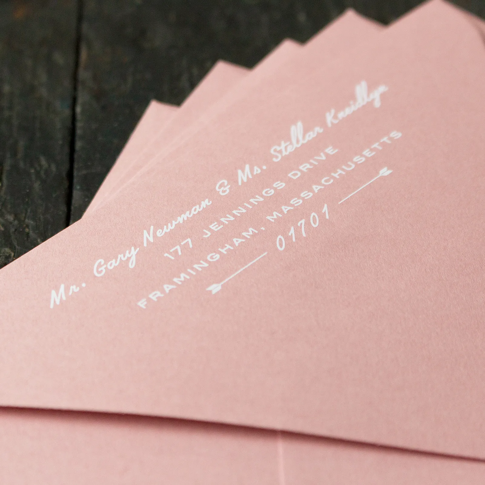 White ink variable addressing on colored envelopes